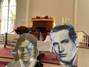 North Parish sanctuary with Francis Harper and Paul Newman cut out faces to welcome people