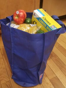 reusable grocery bag full of groceries