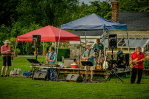 White Street Band members playing outdoors